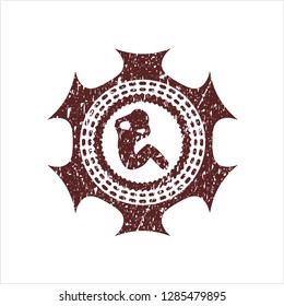 Red crunch icon inside distressed rubber stamp