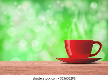 red cup with smoke on green bokeh background 