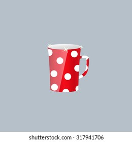 red cup with white dots