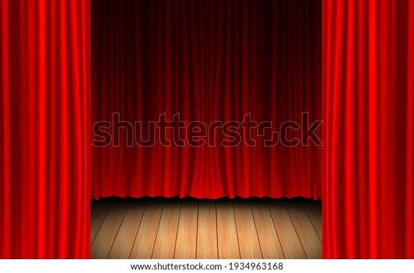 red curtain and light of spotlight on the wooden\
floor in the dark room