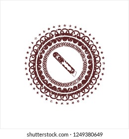 Red cutter icon inside distressed grunge seal