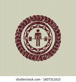 Red deadlift icon inside distressed with rubber seal texture