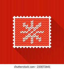 Red decorative stamp with long shadow for postcards and postcrossing. Knitted snowflake
