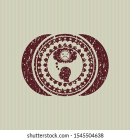 Red depression icon inside rubber seal