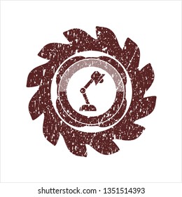 Red desk lamp icon inside distressed rubber stamp