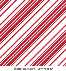Red diagonal striped seamless pattern background suitable for fashion textiles, graphics