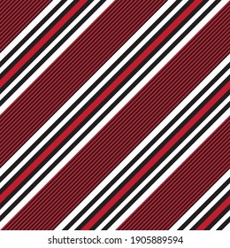 Red diagonal striped seamless pattern background suitable for fashion textiles, graphics