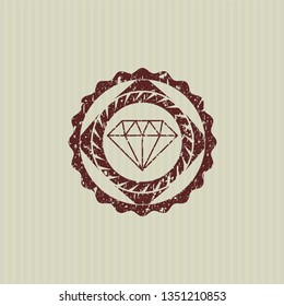 Red diamond icon inside distress rubber stamp with grunge texture