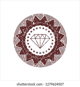 Red diamond icon inside distressed rubber grunge texture seal