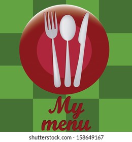 a red dish with some grey utensils in a green background