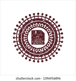 Red diskette icon inside distressed rubber grunge stamp