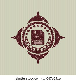 Red diskette icon inside grunge style stamp