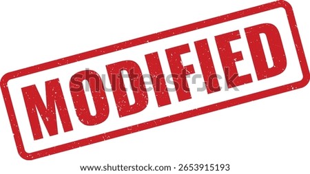 A red, distressed rubber stamp with the word MODIFIED printed in bold, sans-serif font is diagonally positioned against a stark white backdrop, conveying a sense of alteration.