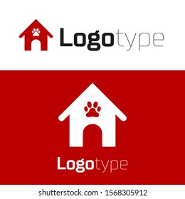 Red Dog house and paw print pet icon isolated on white background. Dog kennel. Logo design template element. Vector Illustration