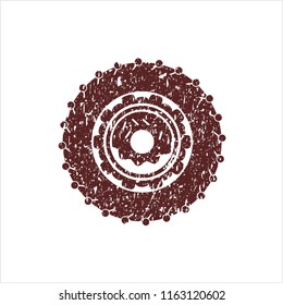 Red donut icon inside distressed with rubber seal texture