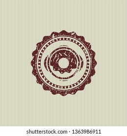 Red donut icon inside distressed rubber grunge texture seal