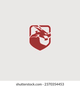 Red dragon shield logo vector on isolated background.