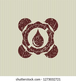 Red drop icon inside distress rubber seal