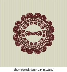 Red dumbbell icon inside distress rubber stamp