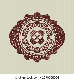 Red dumbbell icon inside distressed grunge stamp