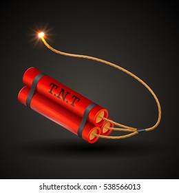 Red Dynamite isolated on a black background with burning fuse.