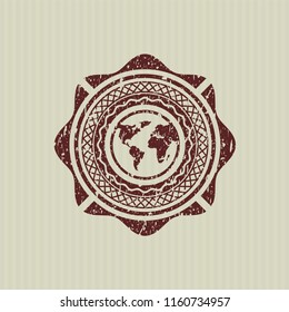 Red earth icon inside distress rubber seal
