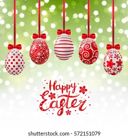 Red Easter eggs on shiny background