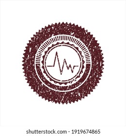 Rotes Elektrokardiogramm-Symbol innerhalb einer bedrückten Gummischmutzmarke. 