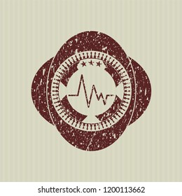  Red electrocardiogram icon inside rubber grunge seal