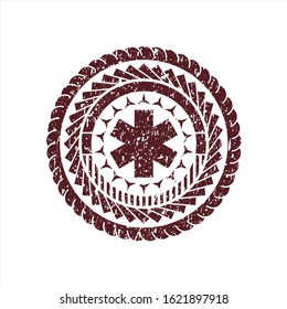 Red emergency cross icon inside distress grunge style stamp
