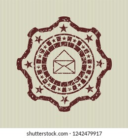 Red envelope icon inside grunge seal