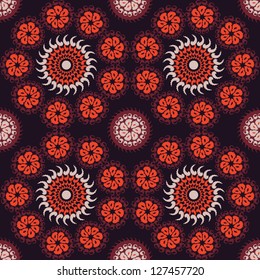 Red ethnicity round ornament, vector illustration with ornate pattern. Seamless abstract vector background.