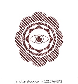 Red eye icon inside distress rubber seal
