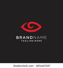 Red eye logo design forming eyes that are staring sharply vision