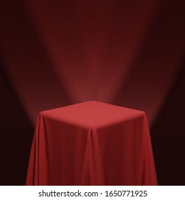 Red fabric covering a cube or a table, with red background and stage spotlights. Can be used as a stand for product display, draped table. Vector illustration