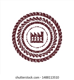 Red factory icon inside distress grunge stamp
