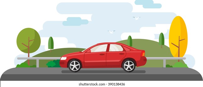 Red Family Sedan Traveling across the countryside