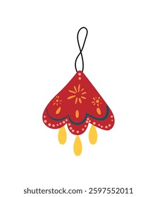 A red festive Christmas bell ornament with decorative patterns and hanging tassels on a white background.