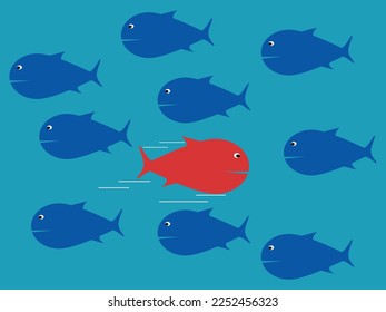 Der rote Fisch schwimmt in die entgegengesetzte Richtung von den anderen Fischen. Mut und Zuversicht. Geschäftsunterschied