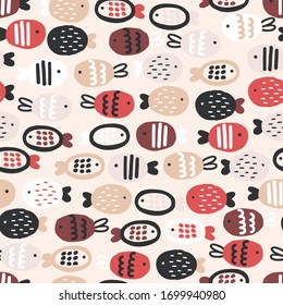 Peces rojos.Un patrón impecable. Fondo infantil creativo bajo el mar. Fondo rosa.