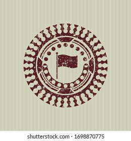 Red flag icon inside rubber grunge stamp