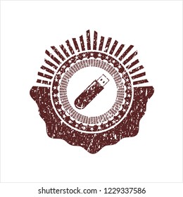 Red flash drive icon inside distressed grunge stamp