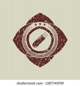 Red flash drive icon inside distress rubber seal