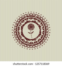 Red flower icon inside distressed rubber grunge seal