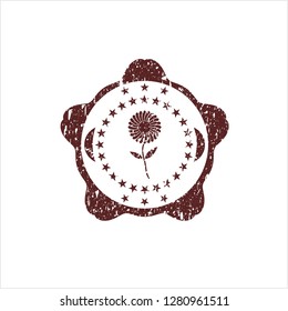 Red flower icon inside rubber grunge stamp