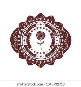 Red flower icon inside rubber seal