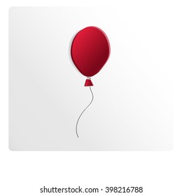 Red flying balloon isolated on white background
