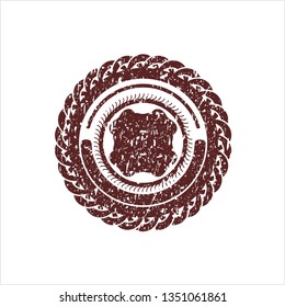 Red four leaf clover icon inside rubber grunge texture stamp