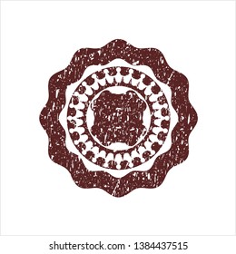 Red four leaf clover icon inside distressed grunge seal
