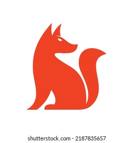 Red Fox Sitting and Looking Away. Vector Logo with Negative Space. Laconic Symbol for Icons, Logos, Badges and Emblems